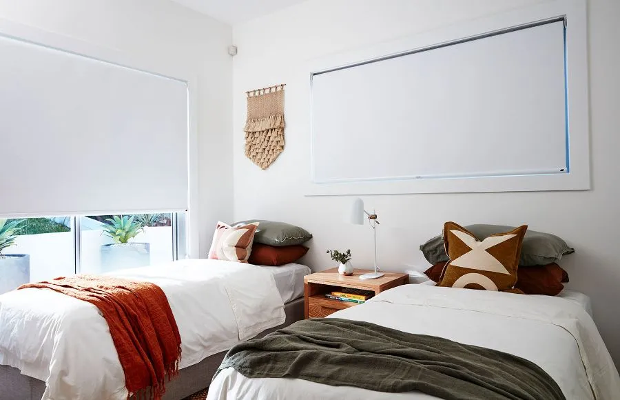 White Blackout Blinds in a Bedroom